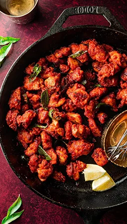 Hygienic food preparation at Maqla Deli restaurant Aluva